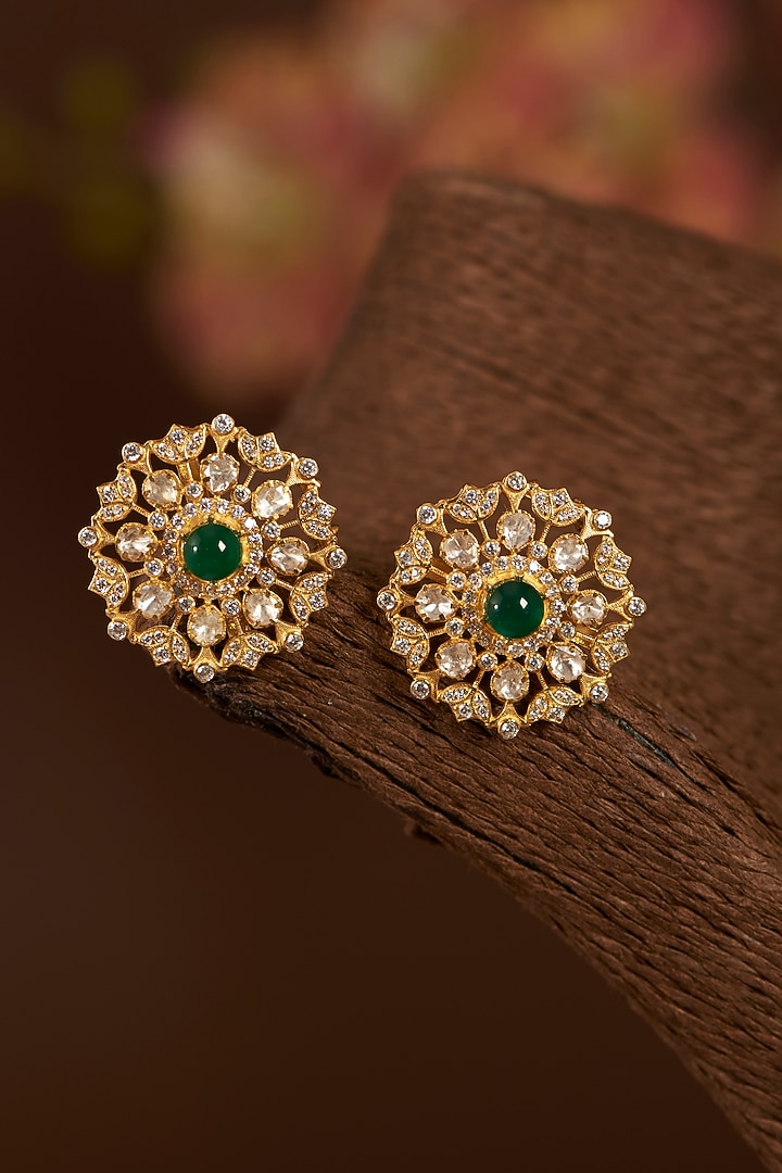Gold Finish Moissanite Polki & Synthetic Emerald Stud Earrings In Sterling Silver by STELLA CREATIONS at Pernia's Pop Up Shop