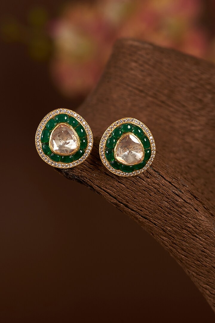 Gold Finish Moissanite Polki & Synthetic Emerald Stud Earrings In Sterling Silver by STELLA CREATIONS at Pernia's Pop Up Shop