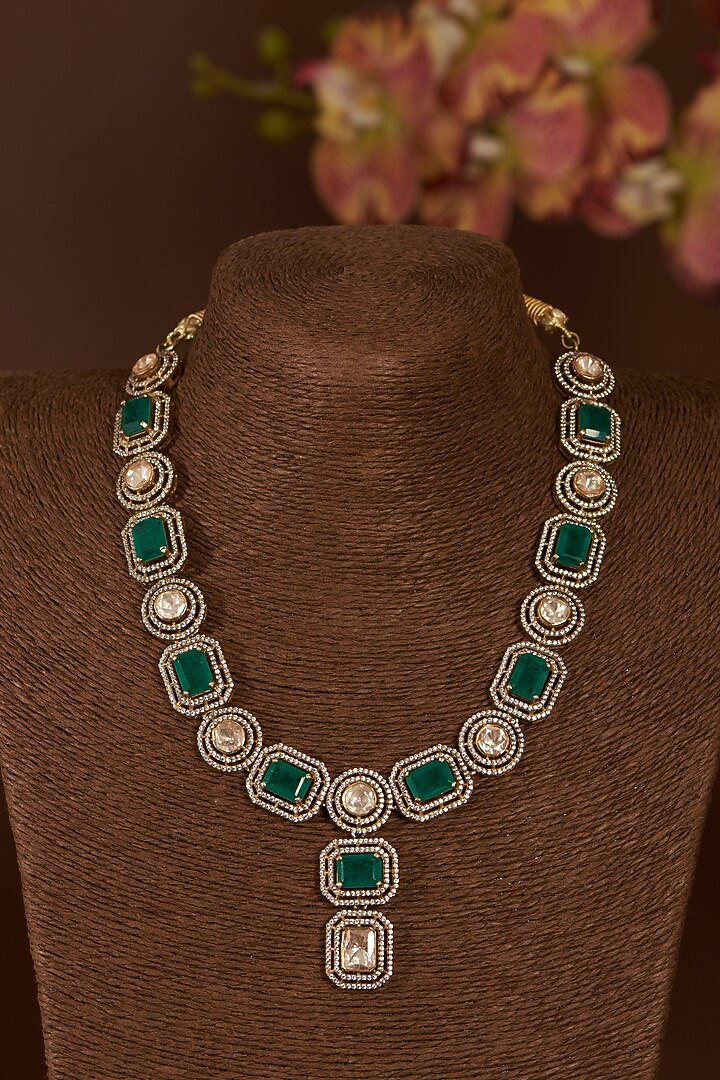 Gold Finish Moissanite Polki & Synthetic Emerald Necklace Set In Sterling Silver by STELLA CREATIONS at Pernia's Pop Up Shop