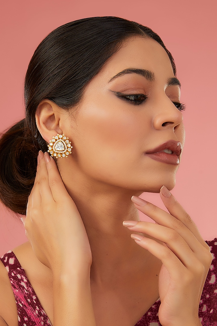 Gold Finish Moissanite Polki & Synthetic Ruby Stud Earrings In Sterling Silver by STELLA CREATIONS at Pernia's Pop Up Shop