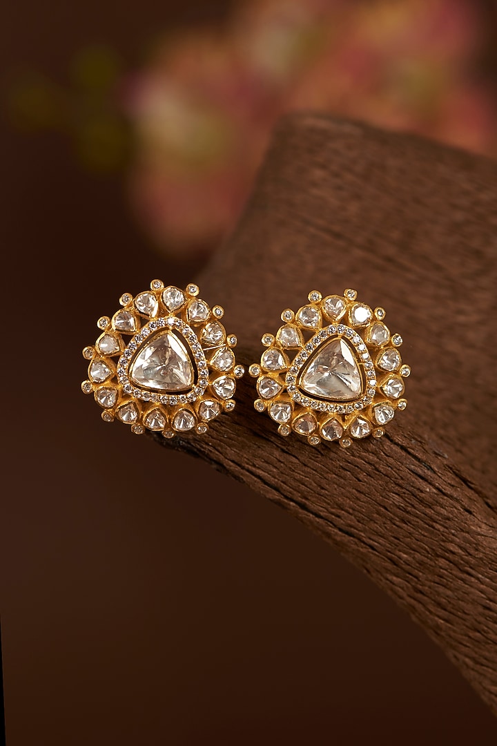 Gold Finish Moissanite Polki & Synthetic Ruby Stud Earrings In Sterling Silver by STELLA CREATIONS at Pernia's Pop Up Shop