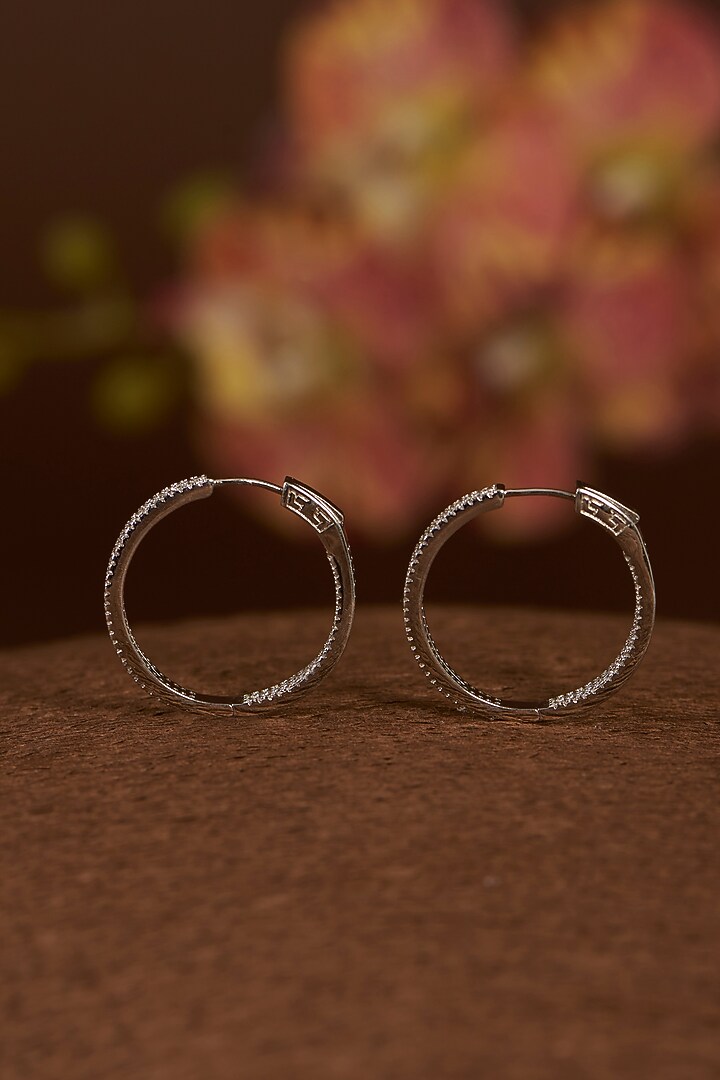 White Finish Eurostar CZ Hoop Earrings In Sterling Silver by STELLA CREATIONS at Pernia's Pop Up Shop