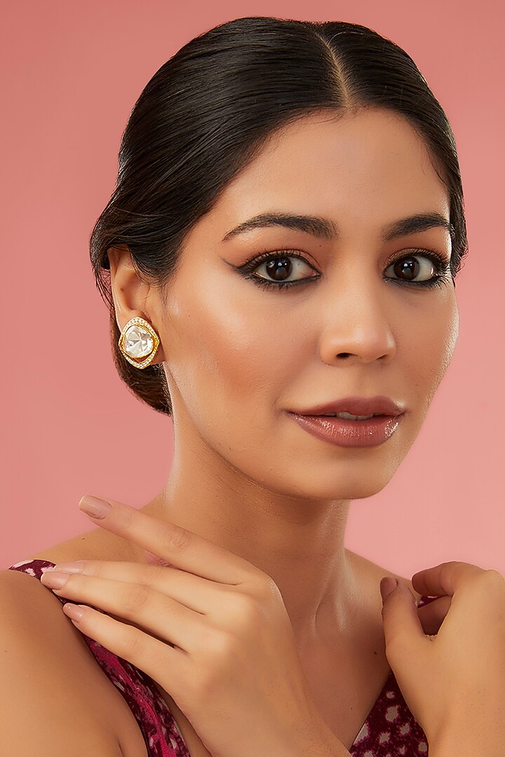 Gold Finish Moissanite Polki & Synthetic Ruby Stud Earrings In Sterling Silver by STELLA CREATIONS at Pernia's Pop Up Shop