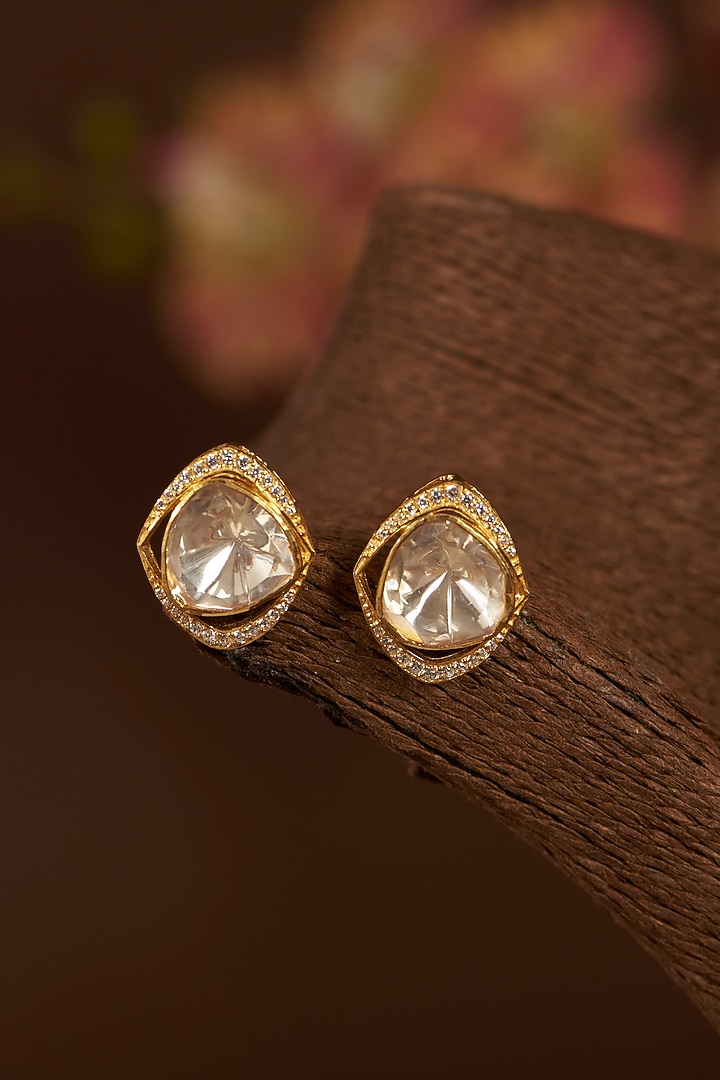 Gold Finish Moissanite Polki & Synthetic Ruby Stud Earrings In Sterling Silver by STELLA CREATIONS at Pernia's Pop Up Shop