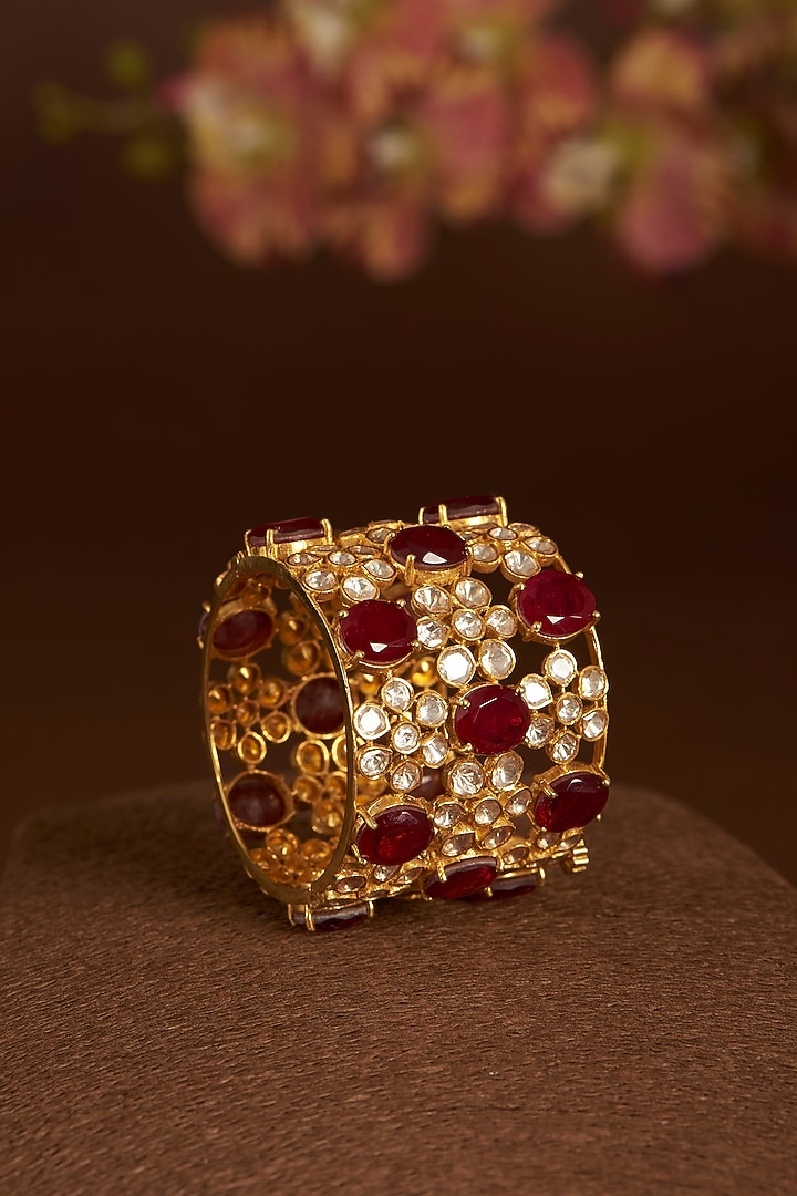 Gold Finish Moissanite Polki & Synthetic Ruby Bangle In Sterling Silver by STELLA CREATIONS at Pernia's Pop Up Shop