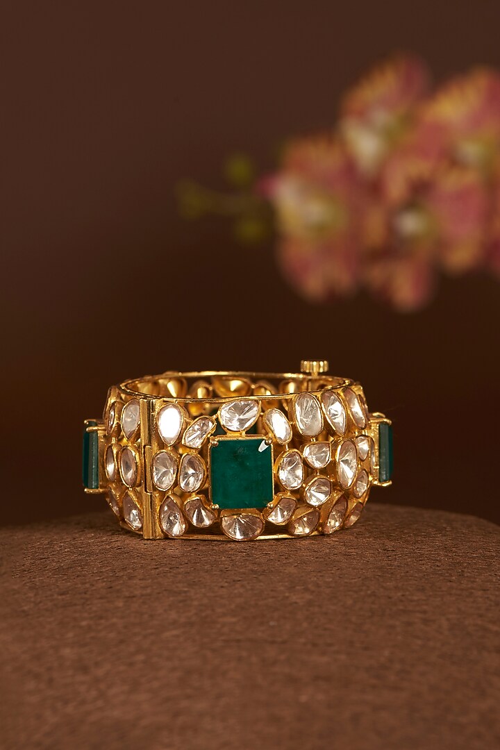 Gold Finish Moissanite Polki & Synthetic Emerald Bangle In Sterling Silver by STELLA CREATIONS at Pernia's Pop Up Shop