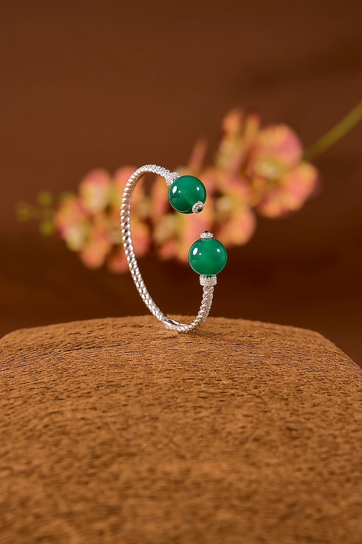 White Finish Zircon & Emerald Stone Bracelet In Sterling Silver by STELLA CREATIONS at Pernia's Pop Up Shop