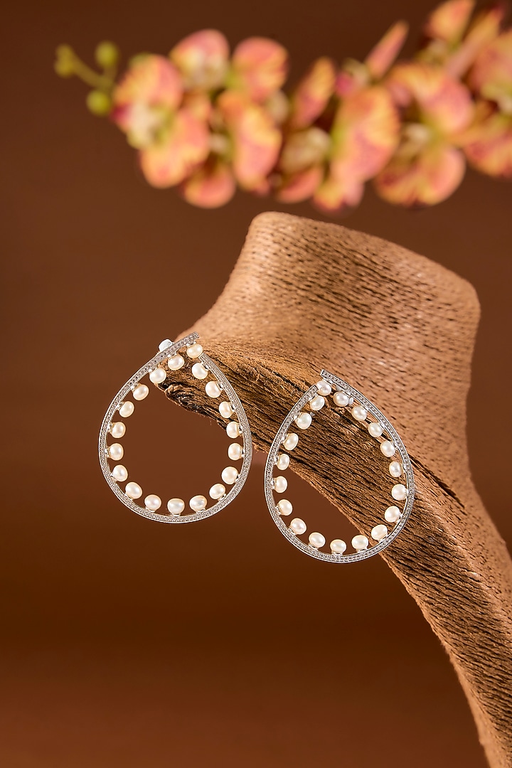 White Finish Pearl Hoop Earrings In Sterling Silver by STELLA CREATIONS at Pernia's Pop Up Shop