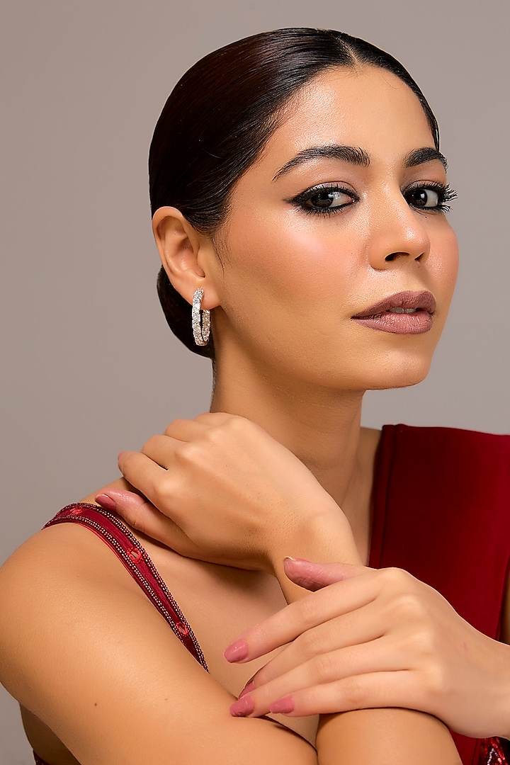 White Finish Zircon Hoop Earrings In Sterling Silver by STELLA CREATIONS at Pernia's Pop Up Shop