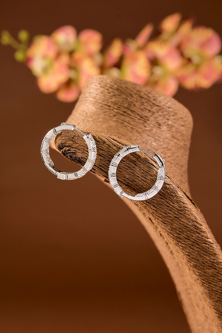 White Finish Zircon Hoop Earrings In Sterling Silver by STELLA CREATIONS at Pernia's Pop Up Shop