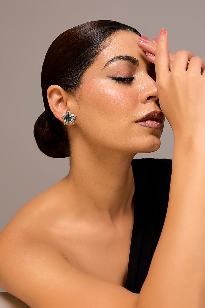 White Finish Zircon & Emerald Stone Stud Earrings In Sterling Silver by STELLA CREATIONS at Pernia's Pop Up Shop