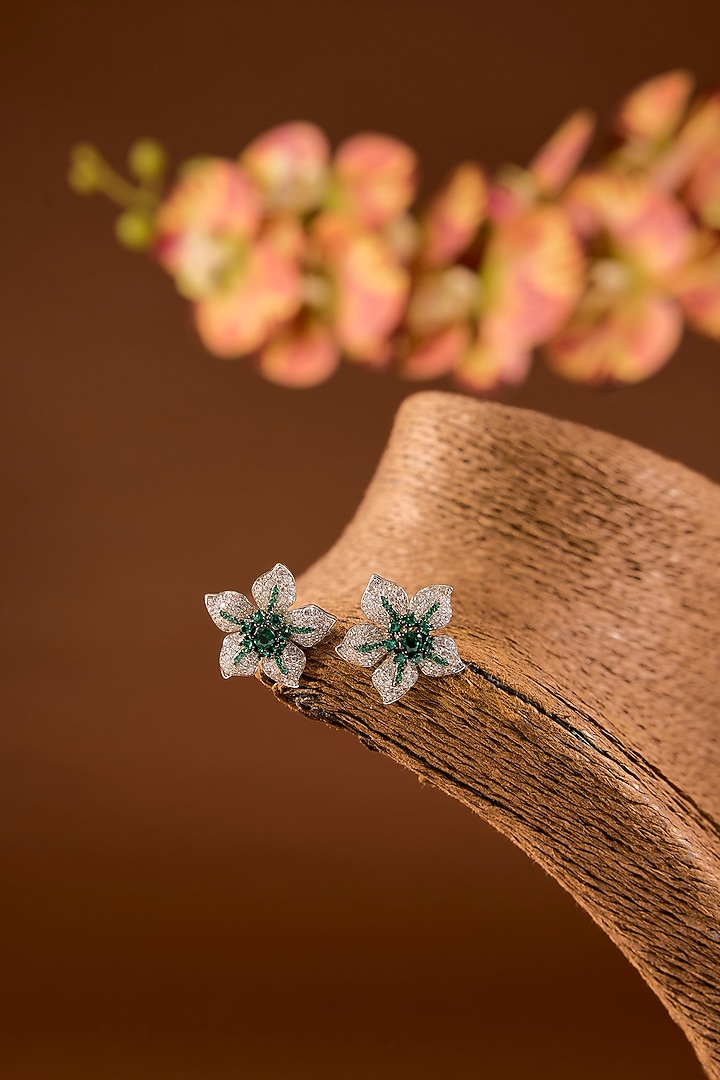 White Finish Zircon & Emerald Stone Stud Earrings In Sterling Silver by STELLA CREATIONS at Pernia's Pop Up Shop