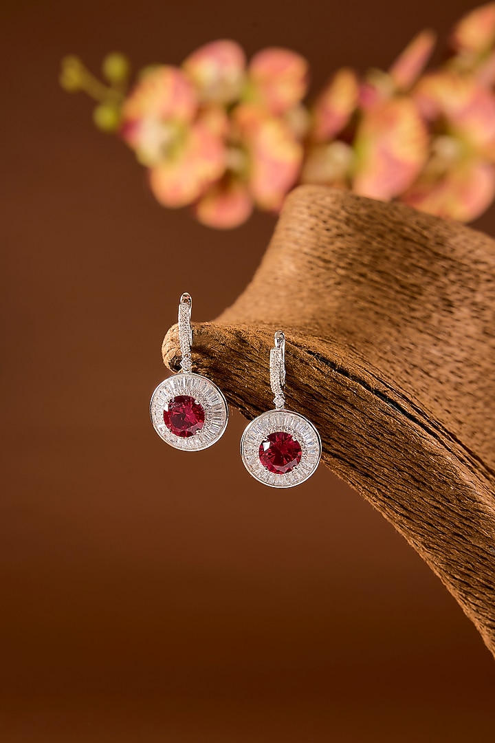 White Finish Zircon & Ruby Stone Stud Earrings In Sterling Silver by STELLA CREATIONS at Pernia's Pop Up Shop
