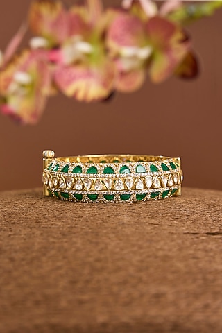 Yellow Gold Finish Moissanite Polki & Emerald Stone Openable Bangle In Sterling Silver by STELLA CREATIONS