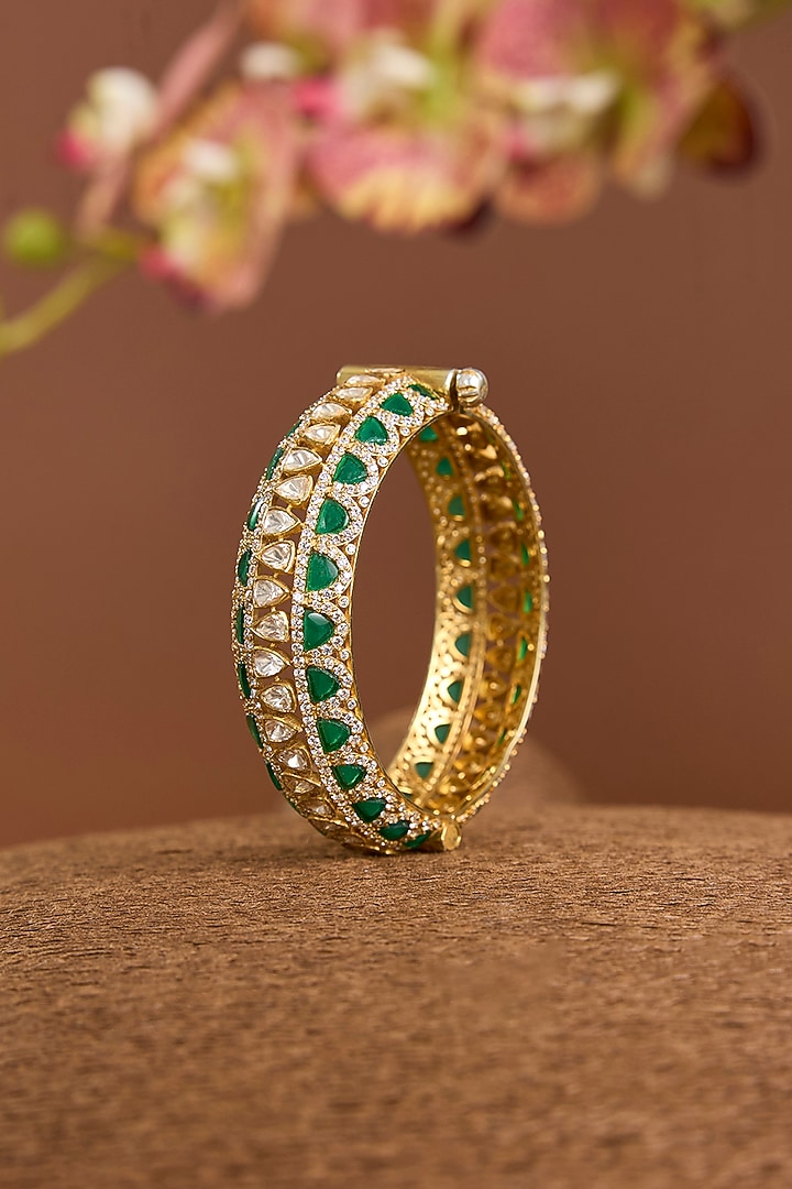 Yellow Gold Finish Moissanite Polki & Emerald Stone Openable Bangle In Sterling Silver by STELLA CREATIONS at Pernia's Pop Up Shop