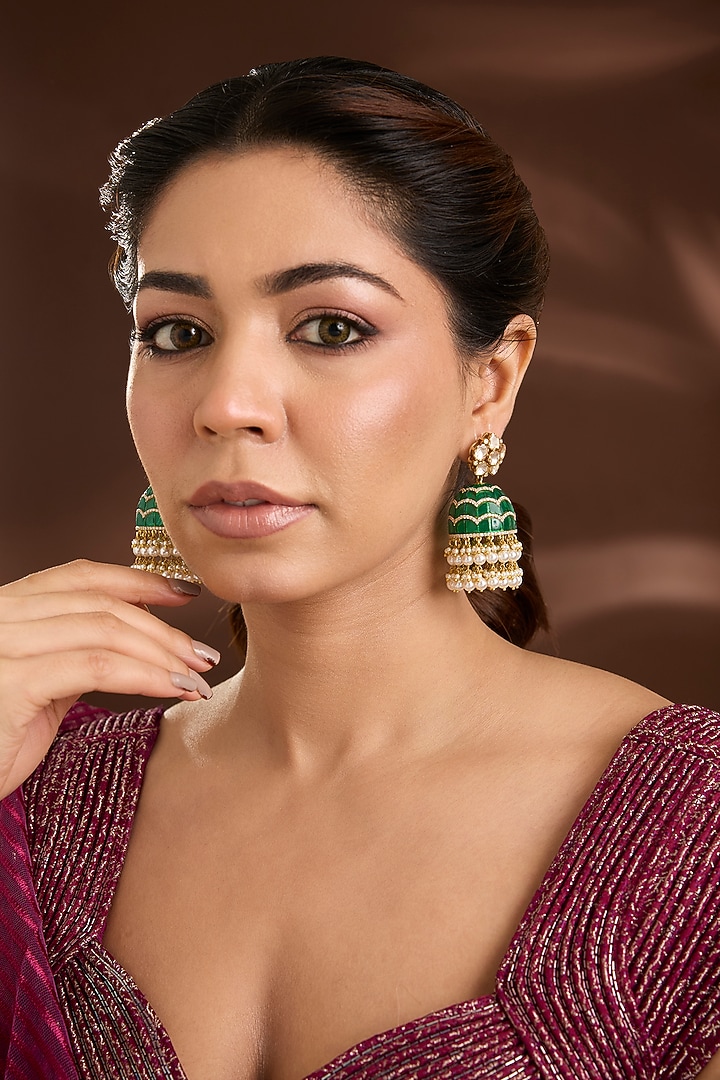 Yellow Gold Finish Moissanite Polki & Emerald Stone Jhumka Earrings In Sterling Silver by STELLA CREATIONS at Pernia's Pop Up Shop