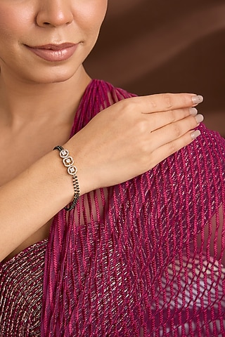 Yellow Gold Finish Eurostar Swarovski & Black Onyx Pearl Openable Bracelet In Sterling Silver by STELLA CREATIONS
