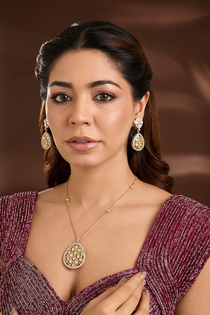 Yellow Gold Finish Moissanite Polki & Eurostar Swarovski Pendant Necklace Set In Sterling Silver by STELLA CREATIONS at Pernia's Pop Up Shop