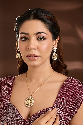 Yellow Gold Finish Moissanite Polki & Eurostar Swarovski Pendant Necklace Set In Sterling Silver by STELLA CREATIONS