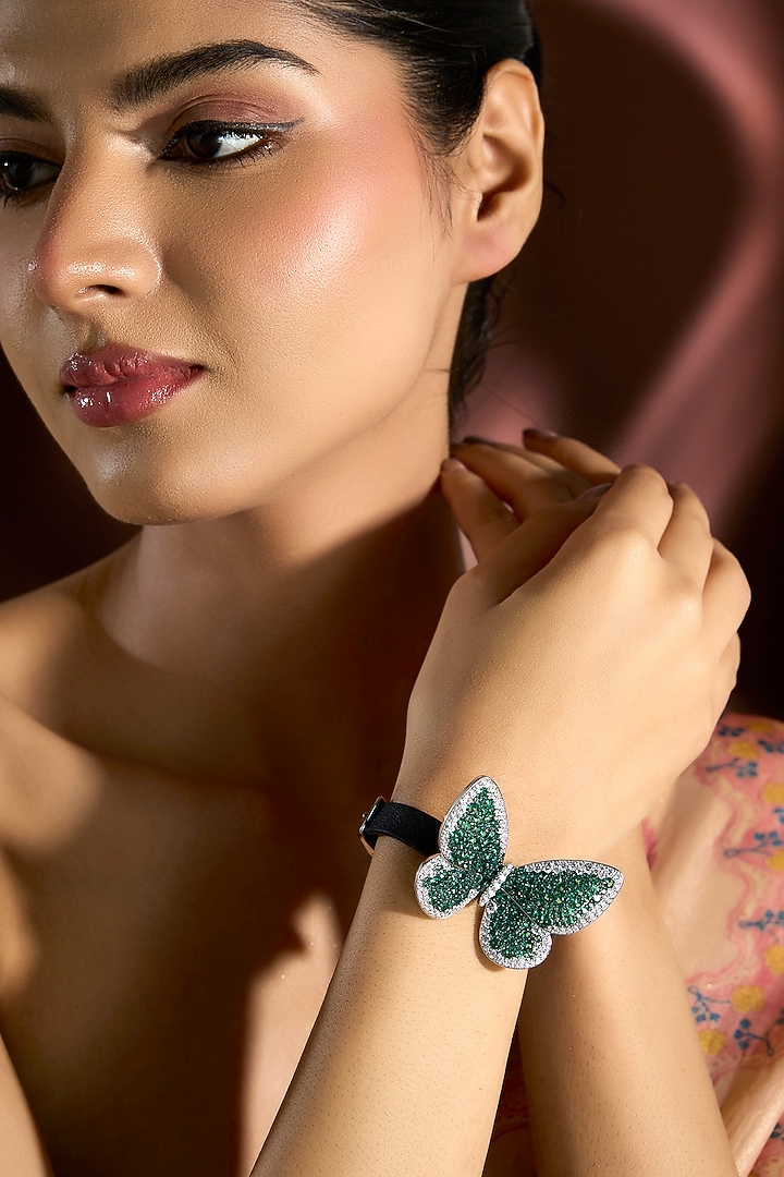 White Gold Finish Emerald & Swarovski Bracelet In Sterling Silver by STELLA CREATIONS at Pernia's Pop Up Shop