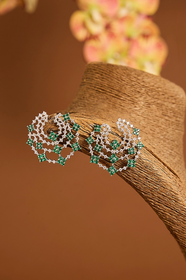 White Gold Finish Eurostar Swarovski & Emerald Stud Earrings In Sterling Silver by STELLA CREATIONS at Pernia's Pop Up Shop