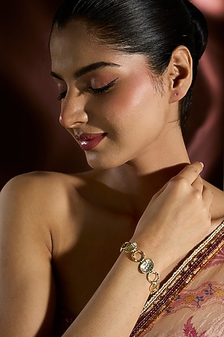 Yellow Gold Finish Swarovski Bracelet In Sterling Silver by STELLA CREATIONS