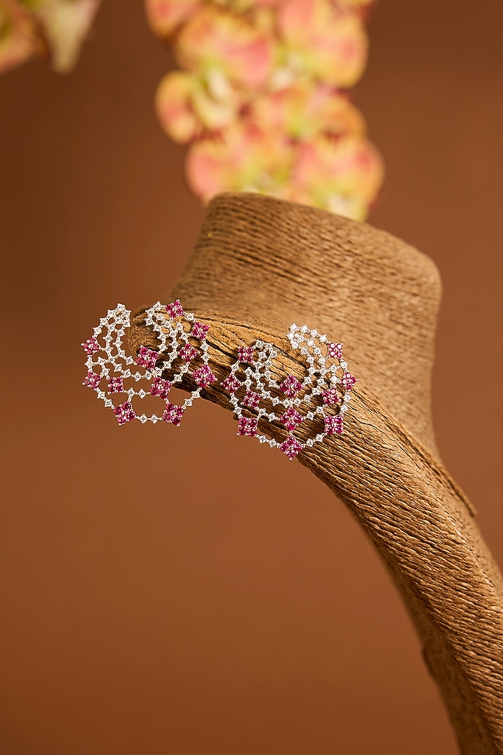 White Gold Finish Swarovski & Ruby Stud Earrings In Sterling Silver by STELLA CREATIONS at Pernia's Pop Up Shop