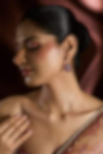 White Gold Finish Swarovski & Ruby Stud Earrings In Sterling Silver by STELLA CREATIONS at Pernia's Pop Up Shop