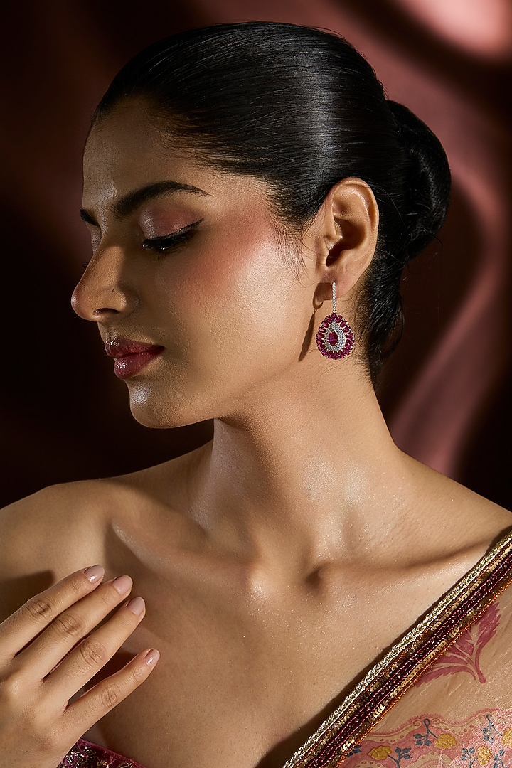 White Gold Finish Swarovski & Ruby Stud Earrings In Sterling Silver by STELLA CREATIONS at Pernia's Pop Up Shop