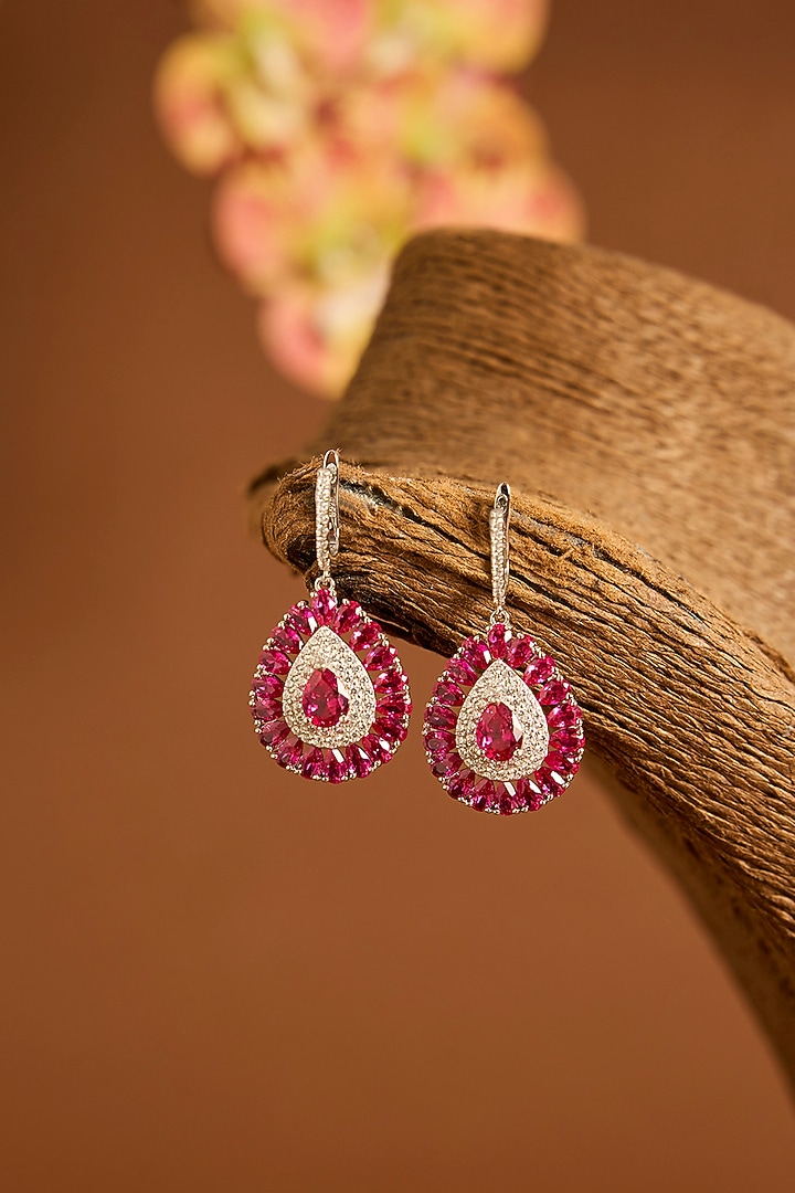 White Gold Finish Swarovski & Ruby Stud Earrings In Sterling Silver by STELLA CREATIONS at Pernia's Pop Up Shop