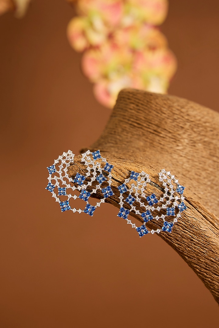 White Gold Finish Swarovski & Sapphire Stud Earrings In Sterling Silver by STELLA CREATIONS at Pernia's Pop Up Shop
