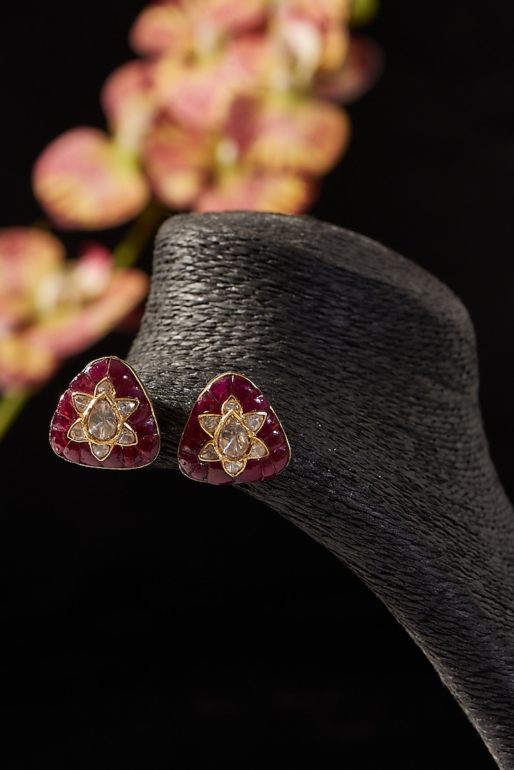 Gold Finish Ruby & Polki Stud Earrings In Sterling Silver by STELLA CREATIONS