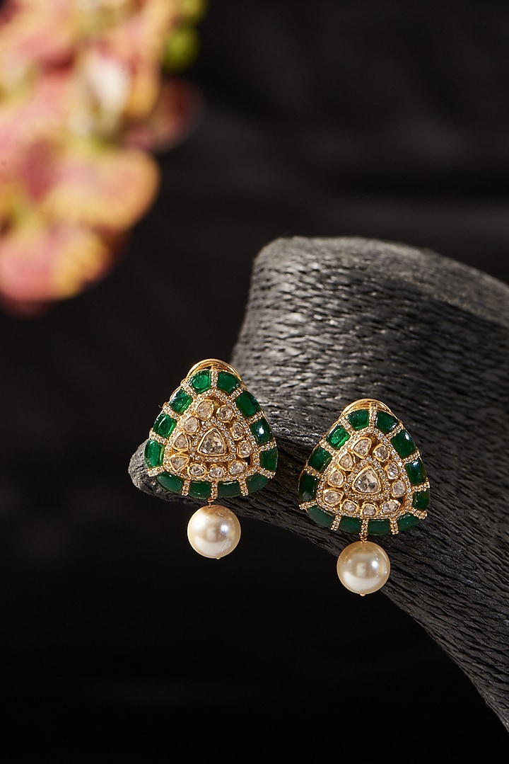 Gold Finish Moissanite Polki & Emerald Stud Earrings In Sterling Silver by STELLA CREATIONS at Pernia's Pop Up Shop