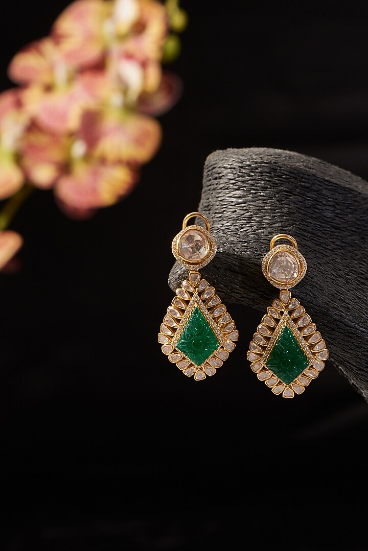 Gold Finish Synthetic Emerald Stone & Moissanite Polki Dangler Earrings In Sterling Silver by STELLA CREATIONS at Pernia's Pop Up Shop