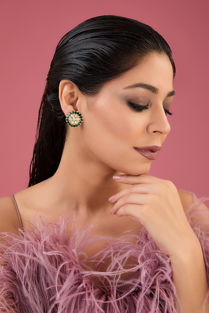 Gold Finish Moissanite Polki & Emerald Stud Earrings In Sterling Silver by STELLA CREATIONS at Pernia's Pop Up Shop