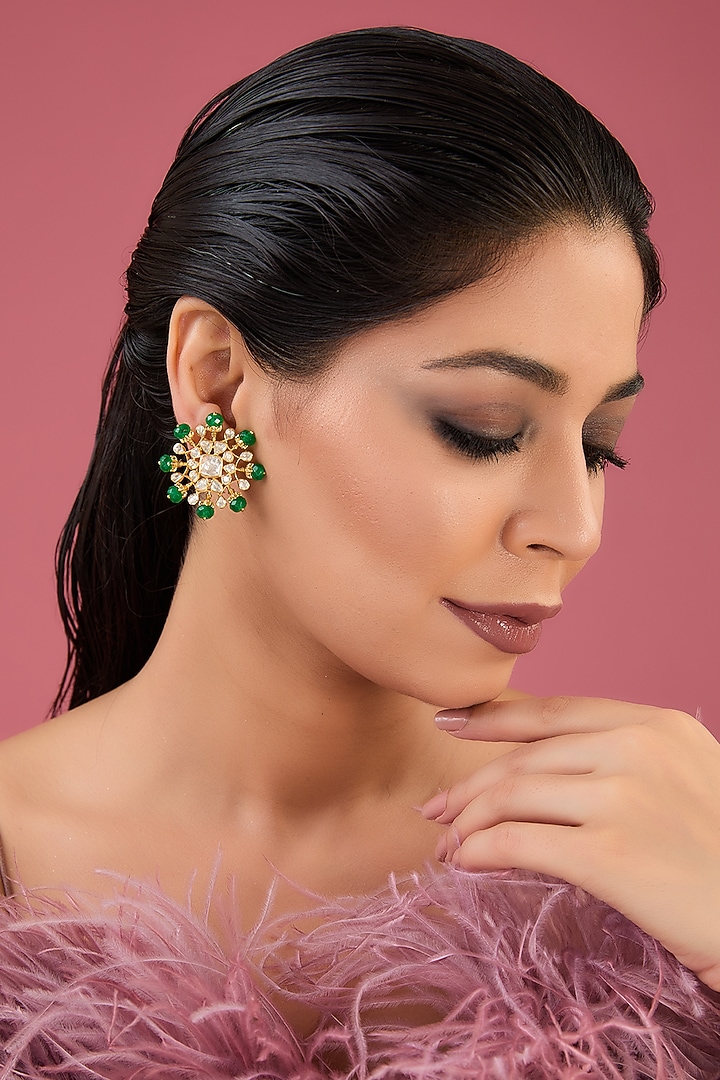 Gold Finish Moissanite Polki & Emerald Stud Earrings In Sterling Silver by STELLA CREATIONS at Pernia's Pop Up Shop