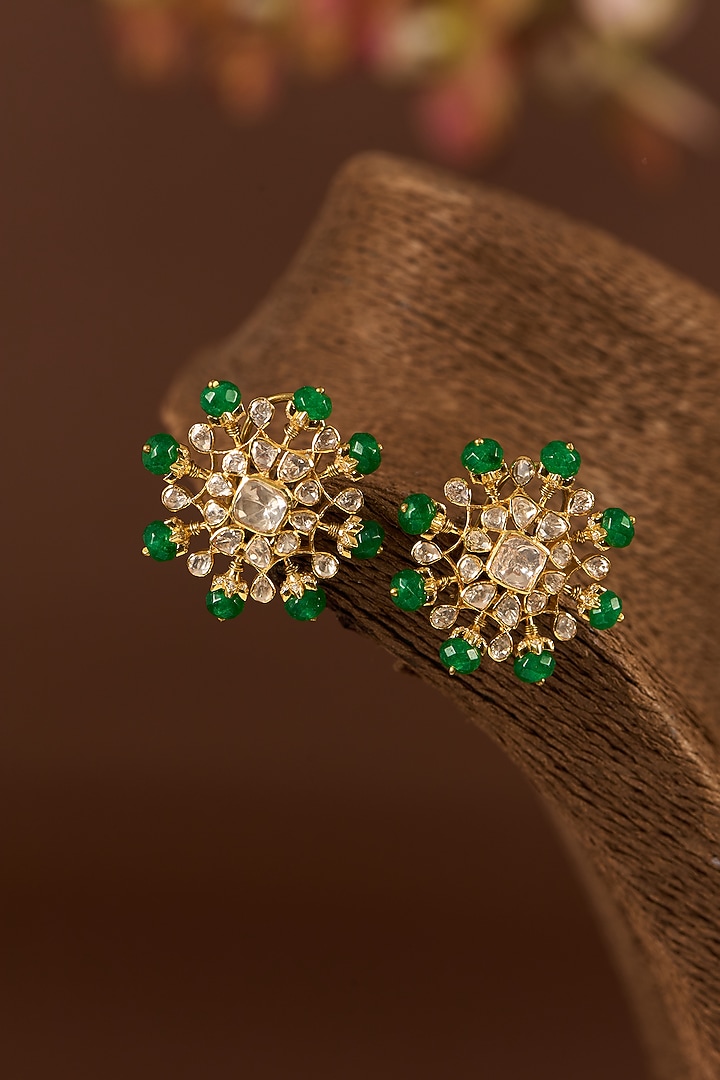 Gold Finish Moissanite Polki & Emerald Stud Earrings In Sterling Silver by STELLA CREATIONS at Pernia's Pop Up Shop