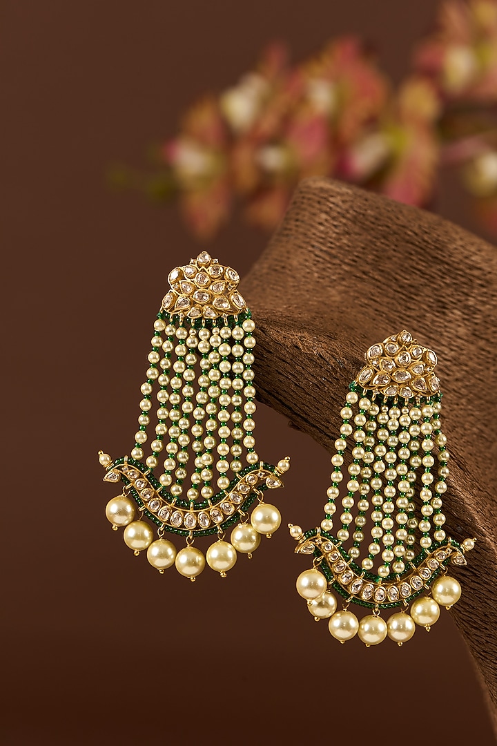 Gold Finish Moissanite Polki & Emerald Dangler Earrings In Sterling Silver by STELLA CREATIONS at Pernia's Pop Up Shop
