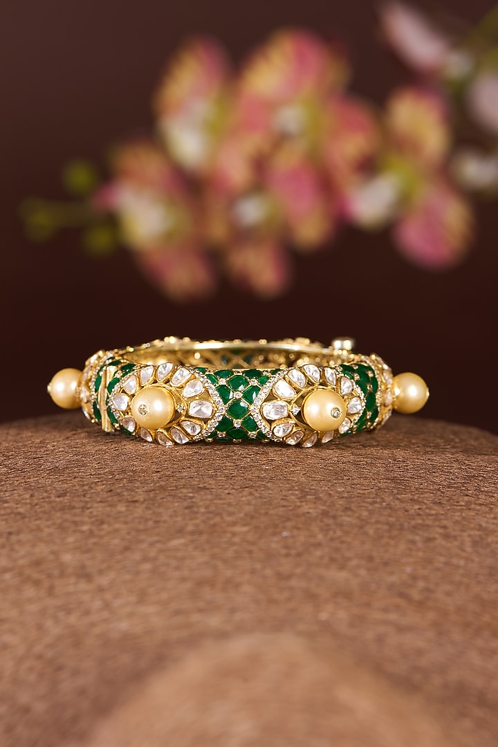 Gold Finish Moissanite Polki & Emerald Bangle In Sterling Silver by STELLA CREATIONS at Pernia's Pop Up Shop