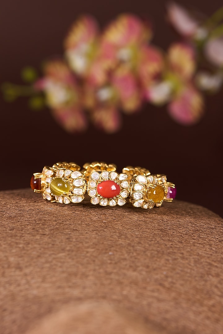Gold Finish Moissanite Polki & Navratna Stone Bangle In Sterling Silver by STELLA CREATIONS at Pernia's Pop Up Shop