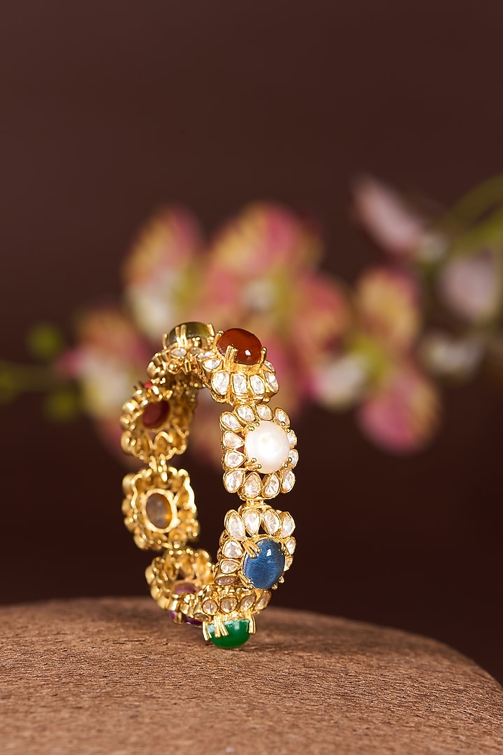 Gold Finish Moissanite Polki & Navratna Stone Bangle In Sterling Silver by STELLA CREATIONS at Pernia's Pop Up Shop