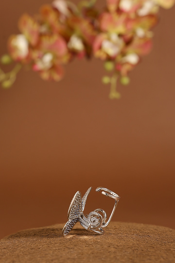 White Gold Finish Swarovski & Sapphire Flapping Ring In Sterling Silver by STELLA CREATIONS at Pernia's Pop Up Shop
