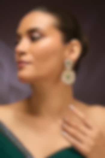 Yellow Gold Finish Moissanite Polki & Emerald Dangler Earrings In Sterling Silver by STELLA CREATIONS at Pernia's Pop Up Shop
