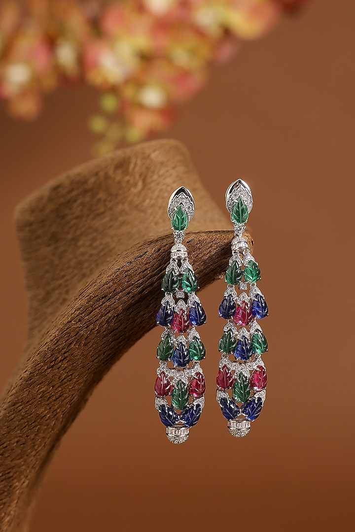 White Gold Finish Swarovski & Emerald Dangler Earrings In Sterling Silver by STELLA CREATIONS at Pernia's Pop Up Shop