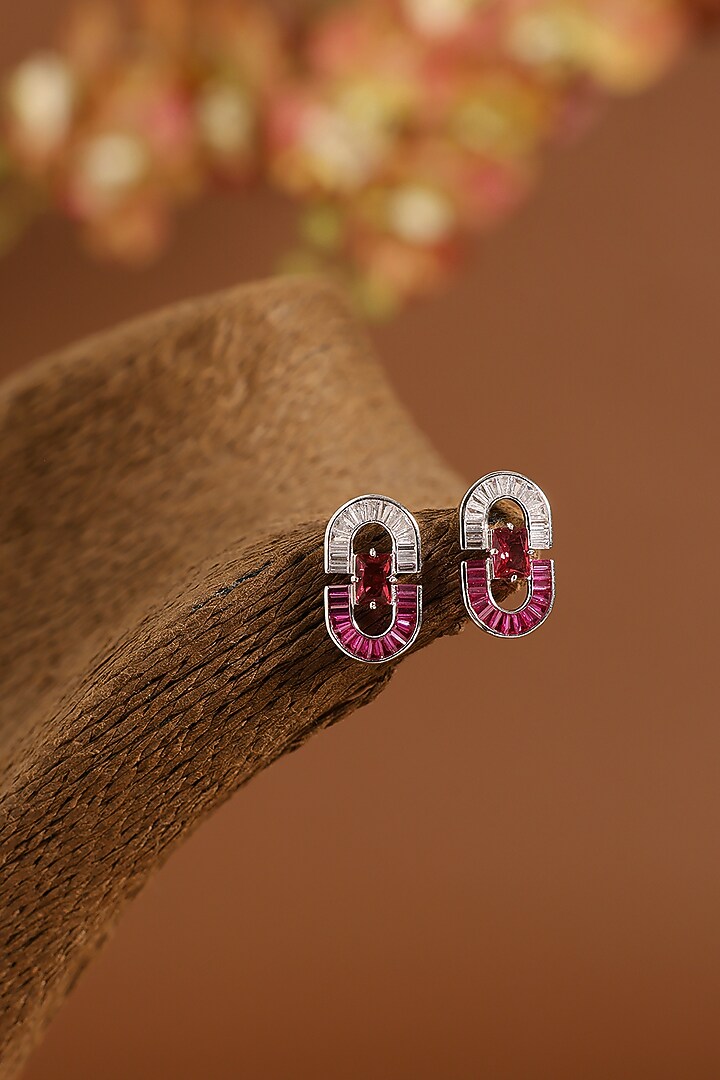 White Gold Finish Swarovski & Ruby Stud Earrings In Sterling Silver by STELLA CREATIONS at Pernia's Pop Up Shop