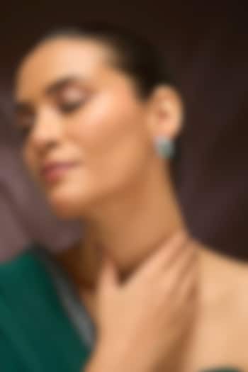 White Gold Finish Swarovski & Emerald Stud Earrings In Sterling Silver by STELLA CREATIONS at Pernia's Pop Up Shop