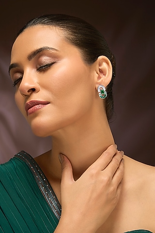 White Gold Finish Swarovski & Emerald Stud Earrings In Sterling Silver by STELLA CREATIONS