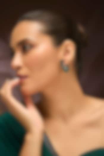 White Gold Finish Swarovski & Emerald Stud Earrings In Sterling Silver by STELLA CREATIONS at Pernia's Pop Up Shop