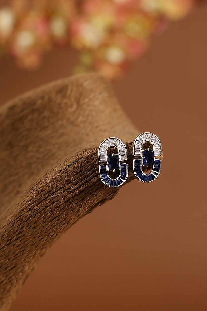 White Gold Finish Swarovski & Sapphire Stud Earrings In Sterling Silver by STELLA CREATIONS at Pernia's Pop Up Shop