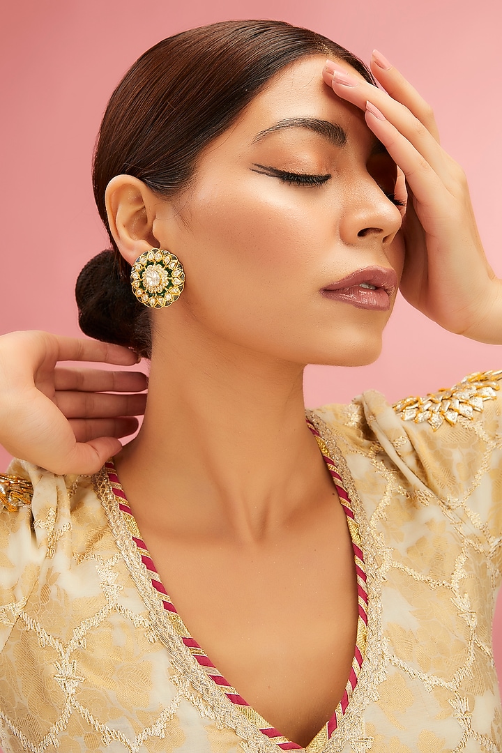Yellow Gold Finish Moissanite Polki & Emerald Stone Stud Earrings In Sterling Silver by STELLA CREATIONS at Pernia's Pop Up Shop